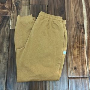 EUC Vuori Performance Joggers size S gold/mustard color